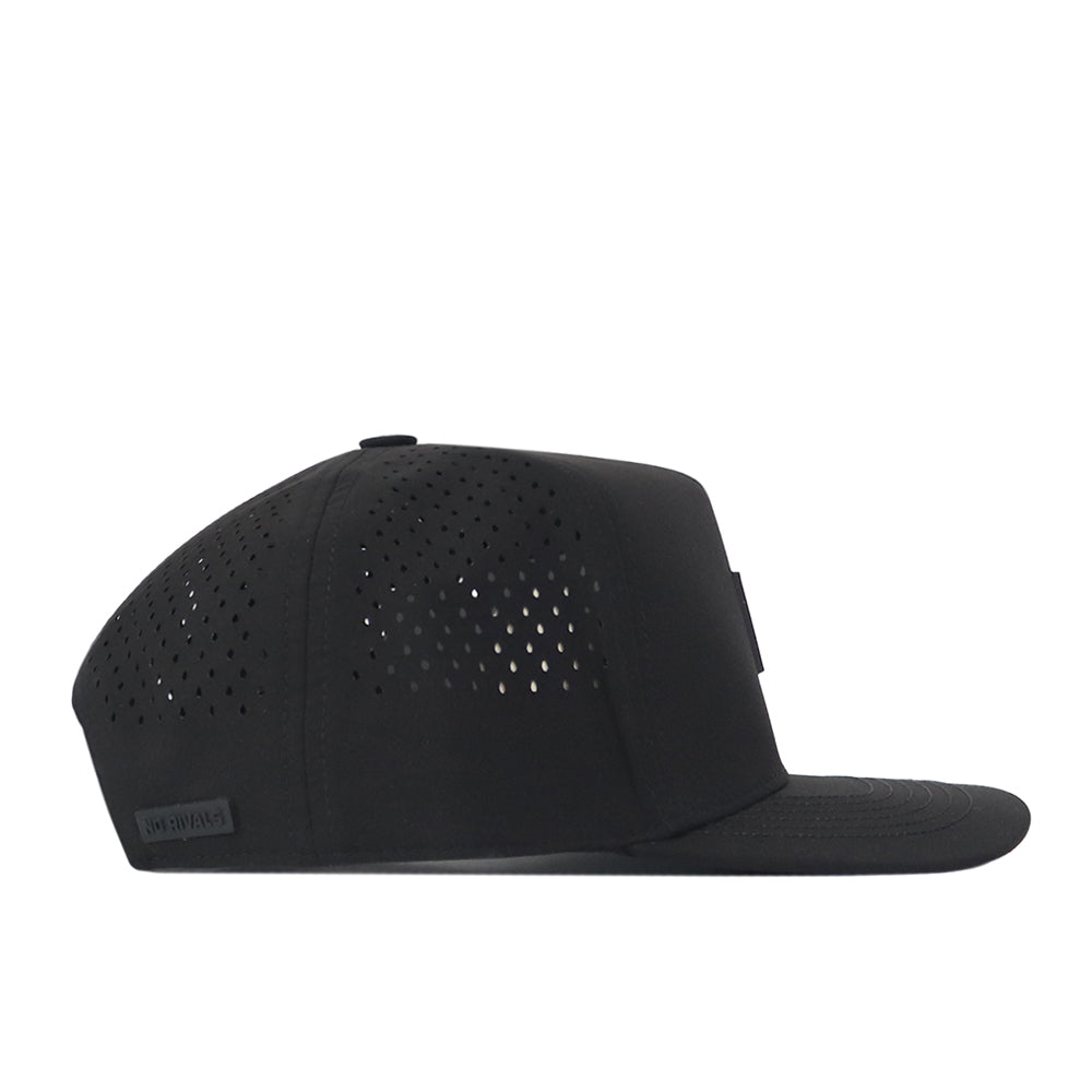 The No Rivals Colorado Buffaloes Trainer Hat is a black, flat-brim snapback featuring small ventilation holes on the side and top panels. Crafted from comfortable cotton for a structured fit, the hat is displayed in a side profile against a white background.