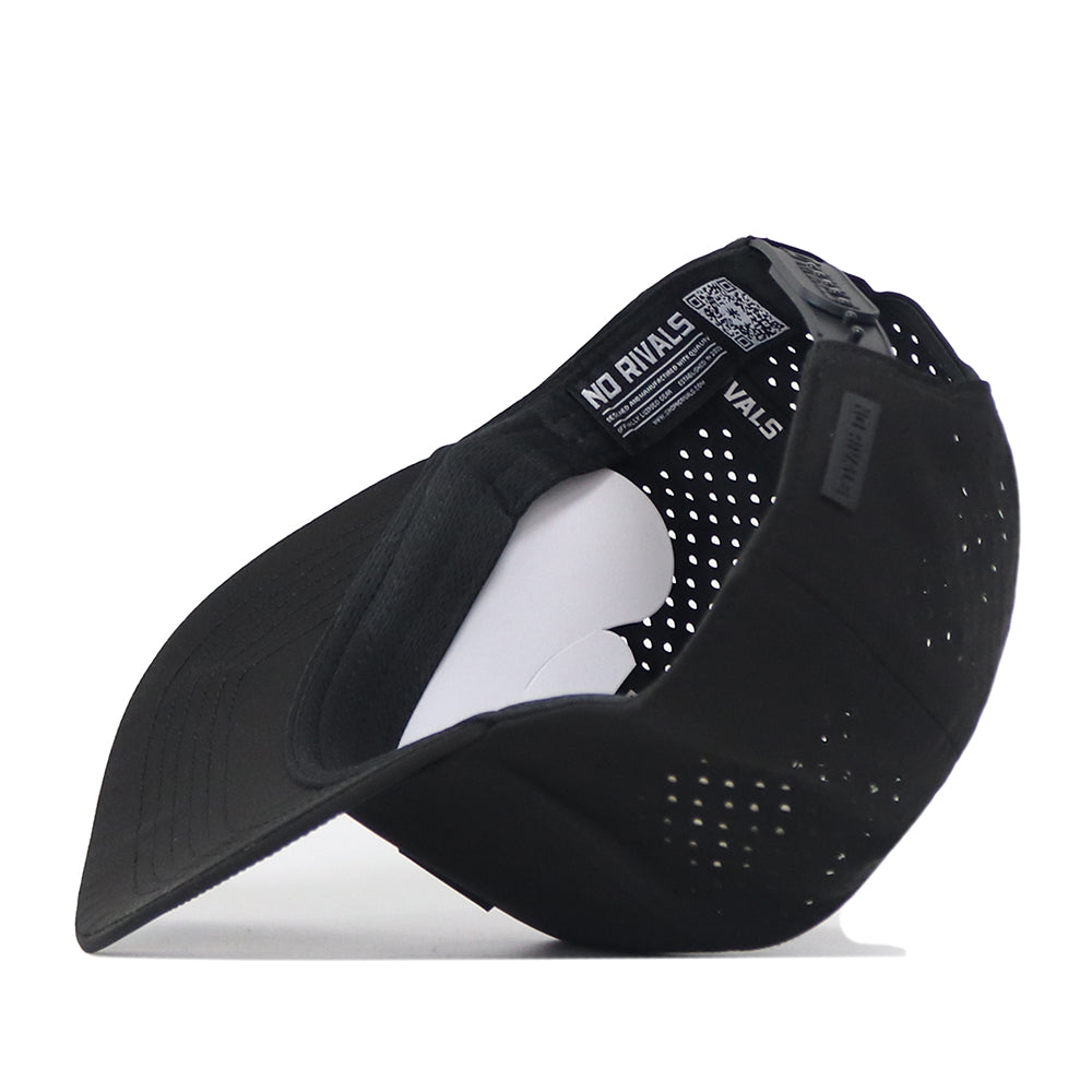 The No Rivals Colorado Buffaloes Trainer Hat is shown flipped upside down, displaying its interior labels and curved brim. Made from breathable cotton, this black perforated snapback cap includes a white paper insert inside to help maintain its structured fit.