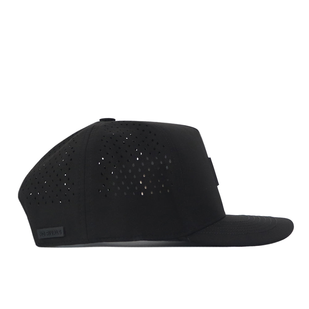 Side view of the Georgia Bulldogs Trainer Hat by No Rivals, a black flat-brimmed snapback featuring small perforated holes on the crown for ventilation and a subtle black label near the back edge, crafted from high-quality cotton for a structured fit.