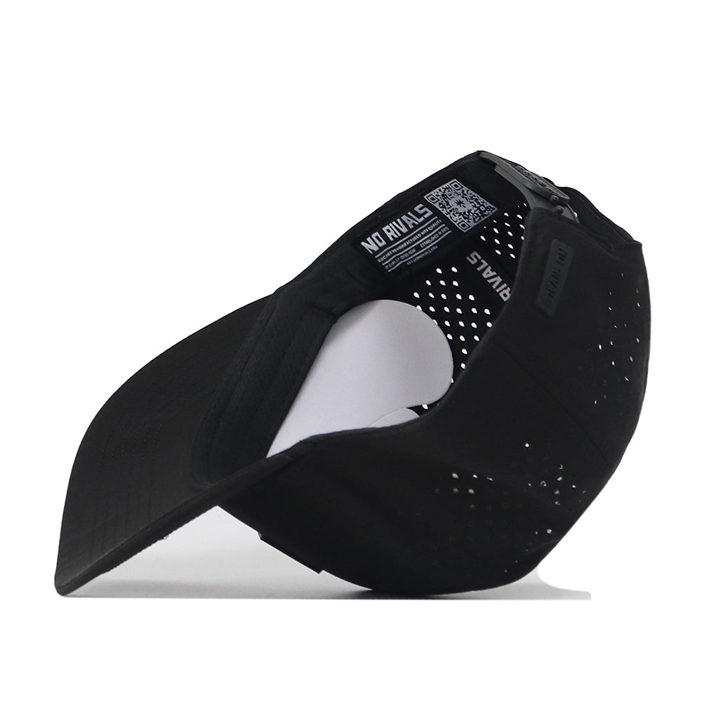 The Georgia Bulldogs Trainer Hat by No Rivals is displayed from the underside, showcasing its interior labels and side ventilation holes. Made from high-quality cotton, this structured snapback cap features a curved brim and an interior tag reading “NO RIVALS.”.
