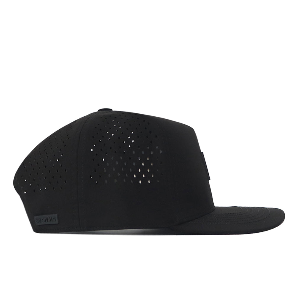The Oregon Ducks Trainer Hat by No Rivals is displayed from the side against a white background. This black snap back hat features a structured fit, flat brim, and ventilation holes. Crafted from high-quality cotton, it combines style with comfort.