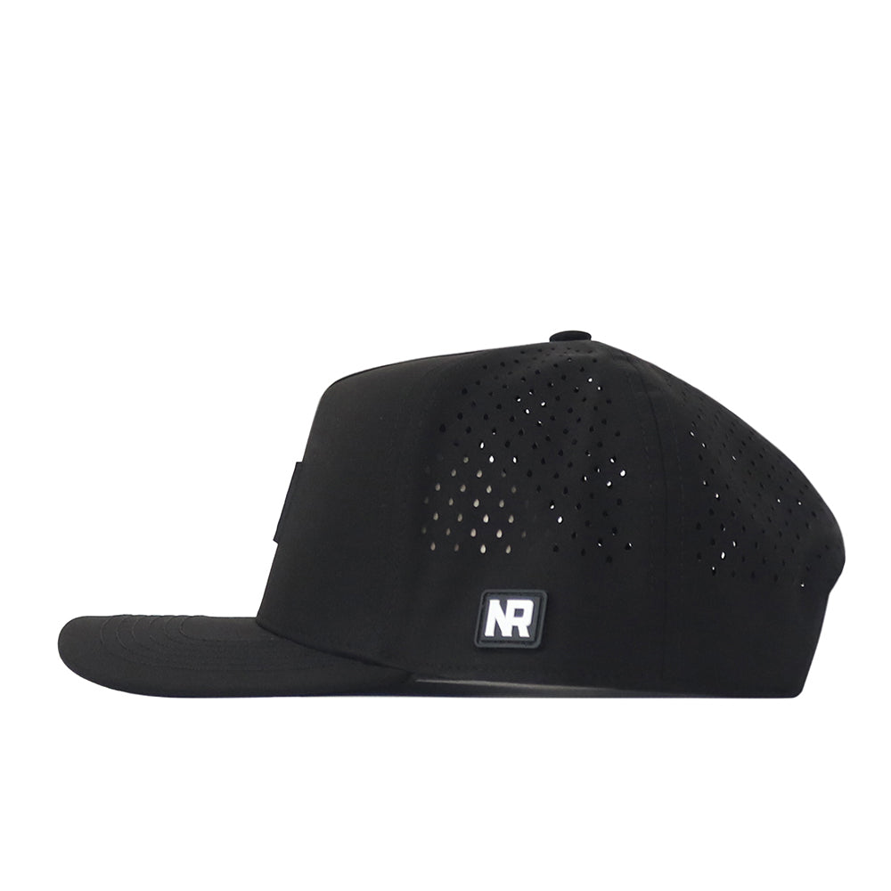 Side view of the Florida Gators Trainer Hat by No Rivals, crafted from high-quality cotton with a structured fit. Features small perforated holes on the back panels and a rectangular NR logo patch on the side.