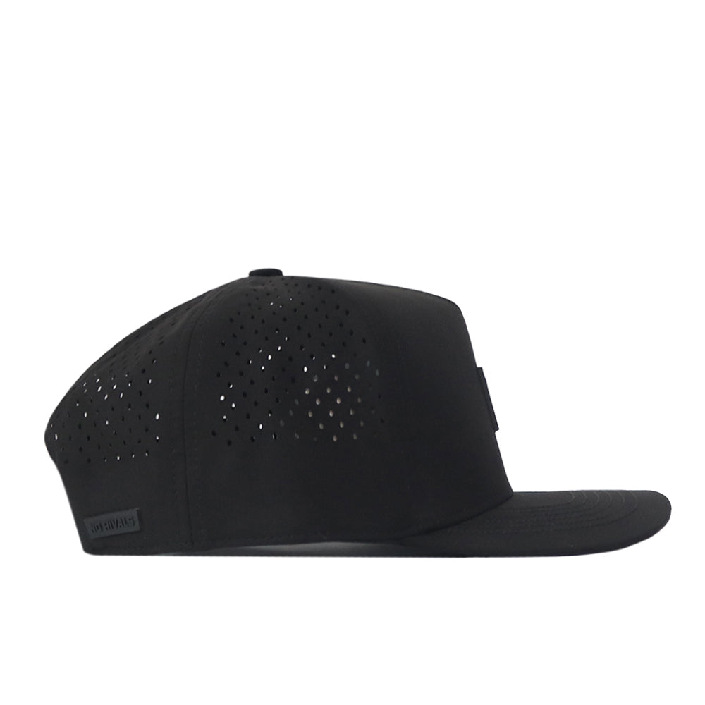 The No Rivals Florida Gators Trainer Hat is a black flat-brim cap with a structured fit, crafted from high-quality cotton. It features small ventilation holes on the sides and a front patch, displayed in a side profile view against a white background.