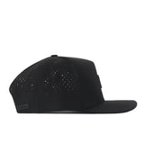 The No Rivals Florida Gators Trainer Hat is a black flat-brim cap with a structured fit, crafted from high-quality cotton. It features small ventilation holes on the sides and a front patch, displayed in a side profile view against a white background.
