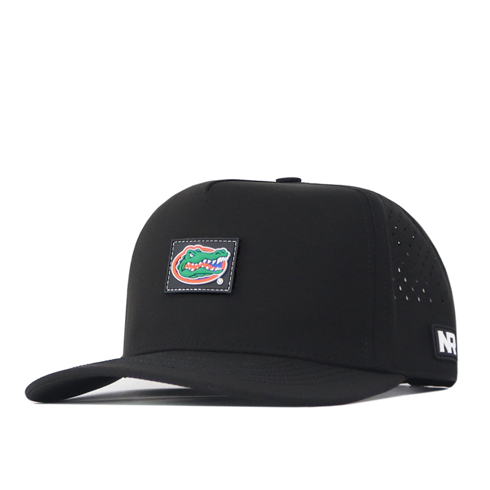Introducing the Florida Gators Trainer Hat by No Rivals—a structured-fit, black flat-brim snapback featuring an embroidered Florida Gators alligator logo on the front and a small No Rivals patch on the side. Crafted from high-quality cotton with perforated sides for ventilation, this cap combines style and comfort for any fan.