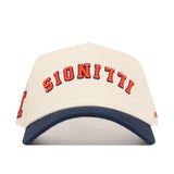 The Upside Down Illinois Hat by No Rivals is a beige cotton baseball cap with SIONITTI in bold red and black on the front, and a structured fit from its curved navy blue brim.