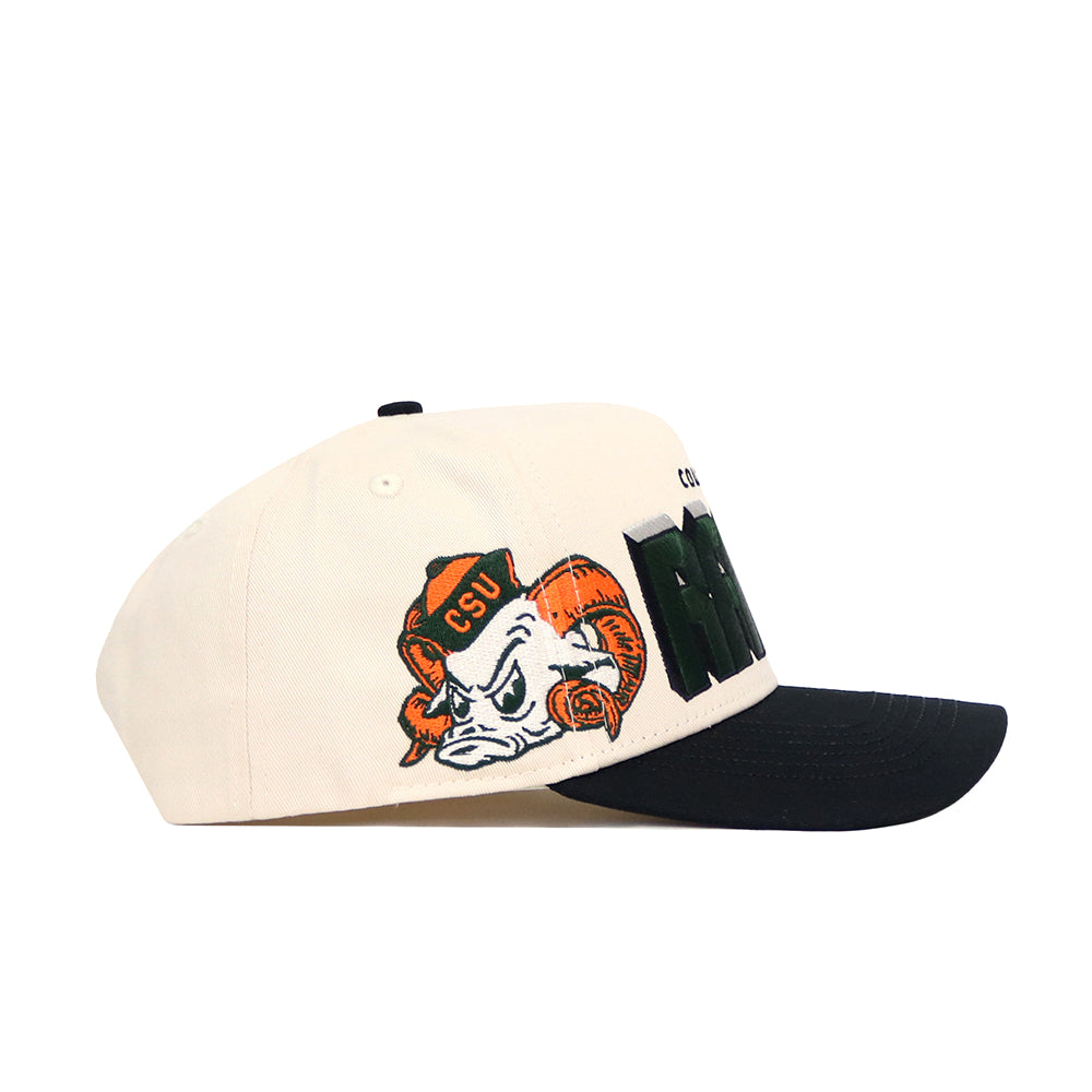 The Colorado State Alma Mater Hat by No Rivals is a cream baseball cap with a black brim, made of high quality cotton, featuring an embroidered ram in a CSU hat and bold side lettering.