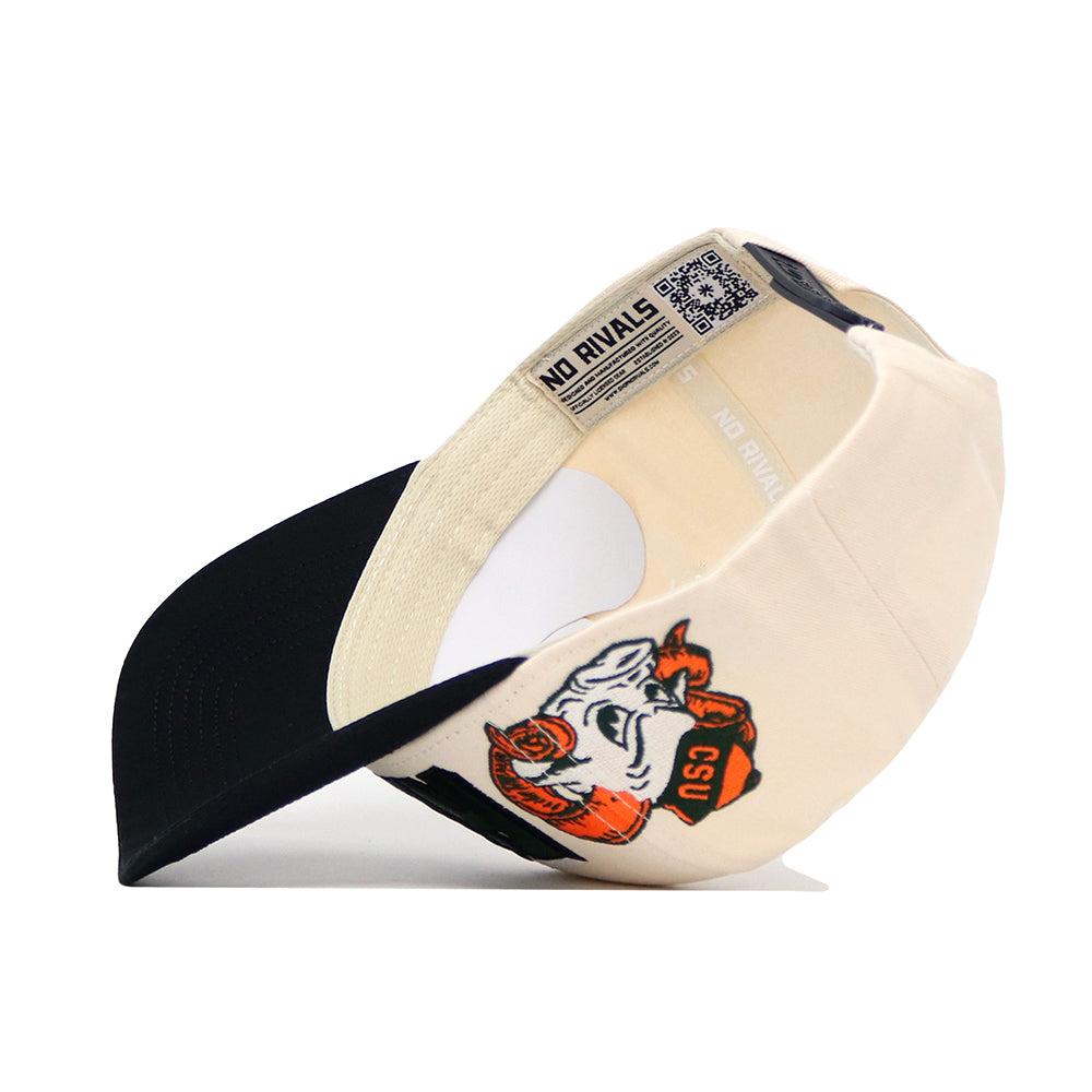 The Colorado State Alma Mater Hat by No Rivals is a beige and black snapback with an embroidered cartoon mascot face, CSU text on the side, structured fit, and "NO RIVALS" printed on the inner sweatband.