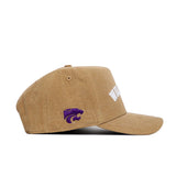 The No Rivals Kansas State Rustic Hat is a brown cotton canvas baseball cap, featuring a purple wildcat logo embroidered on the side and white text on the front, shown in left side profile against a white background.