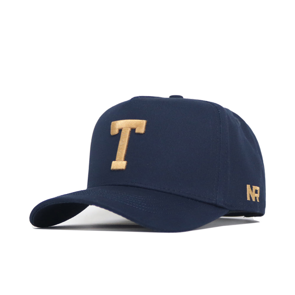The No Rivals Georgia Tech Block T Hat is a navy snapback with a bold gold embroidered T on the front and gold NR initials on the side—an ideal finishing touch for your gameday look.