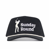 The No Rivals Sunday Round Cord Hat - Black is a cotton corduroy hat with white trim, embroidered golfer logos, "Sunday Round" text on the front, and an adjustable snap back.