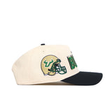 The No Rivals USF Alma Mater Collection features a cream snapback hat with a black brim, an embroidered green and gold bull football helmet, green side text, and is crafted from high quality cotton.