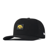 The Iowa Hawkeyes Trainer Hat by No Rivals features a black snapback design with a yellow Hawkeye logo patch on the front, perforated side panels, and a small NR label on the side. Made from high-quality cotton in a structured fit, this cap is worn at a slight angle.