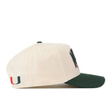 Cream-colored No Rivals Miami Stadium Hat with a dark green visor and an embroidered dark green letter U logo on the side.