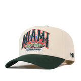No Rivals Miami Stadium Hat in cream with a dark green brim and an embroidered graphic on the front showing a stadium with the text MIAMI Hurricanes.