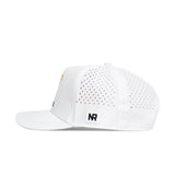 The Kansas Golf Hat - White by No Rivals is a white snapback with side view, featuring small ventilation holes and a rectangular patch with embroidered NR letters on the back panel.