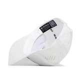 The Kansas Golf Hat - White by No Rivals is shown upside down, highlighting its inside label, QR code, snapback closure, and side ventilation holes.