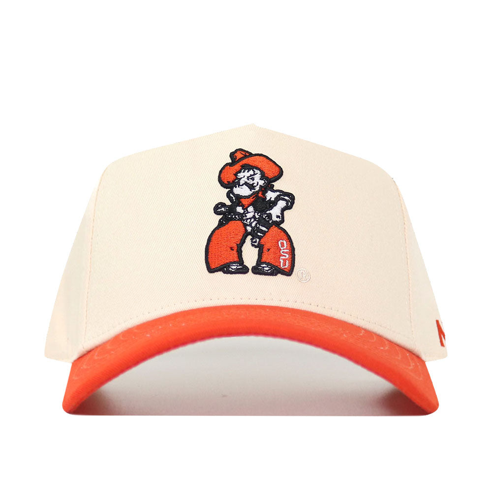 The No Rivals OSU Full Pistol Pete Patch Hat is a cream snapback with an orange brim, structured fit, and Cartoon Cowboy mascot patch featuring "OSU" on the leg. Made from high-quality cotton.