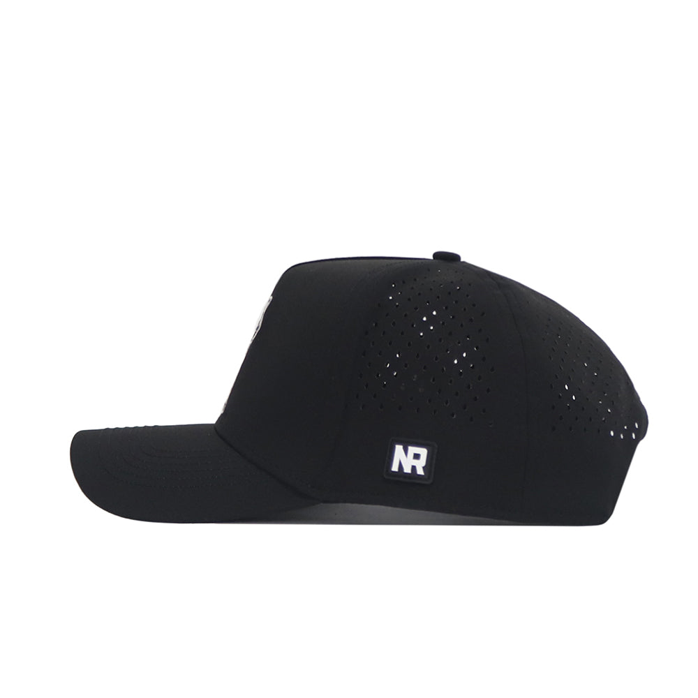 The No Rivals Texas Tech Golf Hat in black features side perforations for ventilation, a rectangular NR logo patch, embroidered graphics, a curved brim, structured crown, and snapback closure. Viewed from the side.