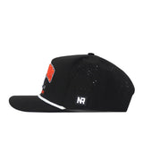 The No Rivals Illinois Fighting Illini Golf Hat in black is a classic snapback, shown from the side with small ventilation holes, a flat bill, and a rectangular NR embroidered logo patch positioned above the brim—perfect for gameday style.