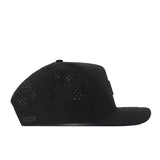 A black Miami Hurricanes Trainer Hat by No Rivals with a flat brim, shown from the side. Crafted from high quality cotton for durability, this cap features small ventilation holes on the side panels and a subtle logo tag near the back, offering both a structured fit and timeless style.