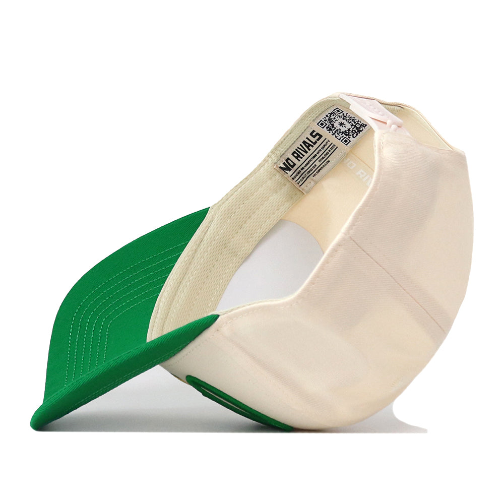 An Oregon Ducks Stride Hat by No Rivals is flipped upside down, revealing the inside label, stitching, and brim. The label displays the No Rivals name alongside a QR code. Made from high-quality cotton, this snapback hat offers a structured fit for lasting comfort and style.
