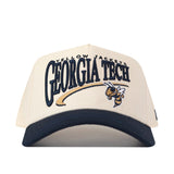Add varsity flair to your gameday fit with the Georgia Tech STRIDE Hat by No Rivals—a cream-colored snapback featuring GEORGIA TECH YELLOW JACKETS embroidered in navy blue and gold, complete with a yellow jacket mascot graphic beneath the text.