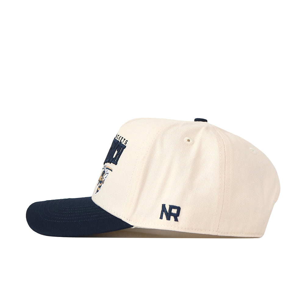 The Georgia Tech STRIDE Hat by No Rivals is a cream snapback with a dark blue brim, detailed with embroidered text and a small NR logo on the side—perfect for your gameday fit.