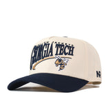 The No Rivals Georgia Tech STRIDE Hat is a beige and navy snapback featuring standout embroidered Georgia Tech lettering and the Yellow Jacket mascot on the front—perfect for taking your gameday fit to the next level.