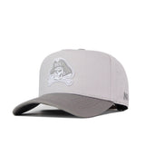 Check out the No Rivals ECU Pirates Graphite Hat—a light gray snapback baseball cap featuring an embroidered pirate logo with ECU lettering on the front and ANCHOR text on the side, shown against a white background. Perfect for your next gameday fit!.
