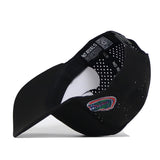 A black Florida Gators Football Mascot Hat by No Rivals is displayed upside down, revealing the team’s logo on the side and “NO RIVALS” text inside the brim. Made from high-quality performance fabric, its interior also features a QR code and perforated ventilation holes.