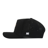 A black LSU Tigers Football Mascot Hat by No Rivals, crafted from performance fabric for enhanced comfort, features ventilation holes on the side, a flat brim, and a small rectangular NR label on the side. The hat is shown in a side profile view.