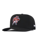 The Clemson Tigers Football Mascot Hat - Black by No Rivals features a cartoon tiger in a football uniform stitched on the front panel and an embroidered NR logo tag on the side. Made from performance fabric, this cap includes a flat brim, small ventilation holes, and a snap back adjustment for a comfortable fit.