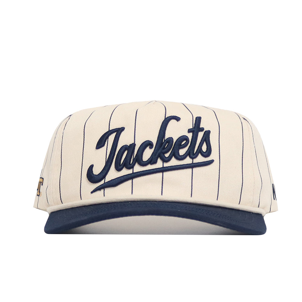 The No Rivals Georgia Tech Vintage "Jackets" Pinstripe Hat features cream cotton with thin navy pinstripes, “Jackets” embroidered in navy script on the front, a navy brim, and an adjustable snap back for comfort.