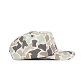 A side view of the No Rivals Iowa State Huntsman Hat, a 5-panel snapback with a green, beige, and brown duck camo pattern and flat brim. A small metal vent hole is visible on the side of the cap.