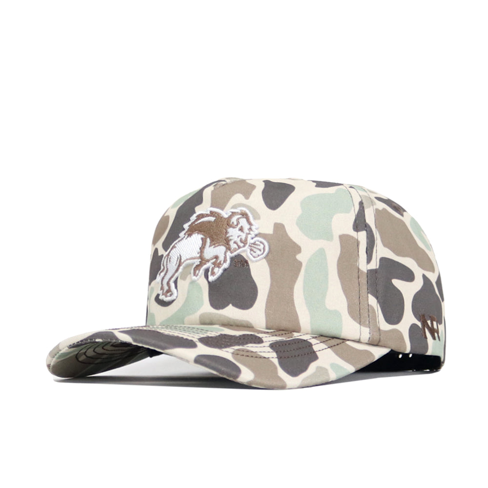 The No Rivals NDSU Huntsman Hat is a 5-panel baseball cap with a curved brim, embroidered roaring lion logo on the front, and green, beige, brown, and black duck camo pattern.