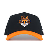 The No Rivals Tennessee Baseball Home Plate Hat is a black cotton blend snapback with an orange brim, showcasing an embroidered large orange T, Vols logo, white home plate shape, and the year 1991 in orange.