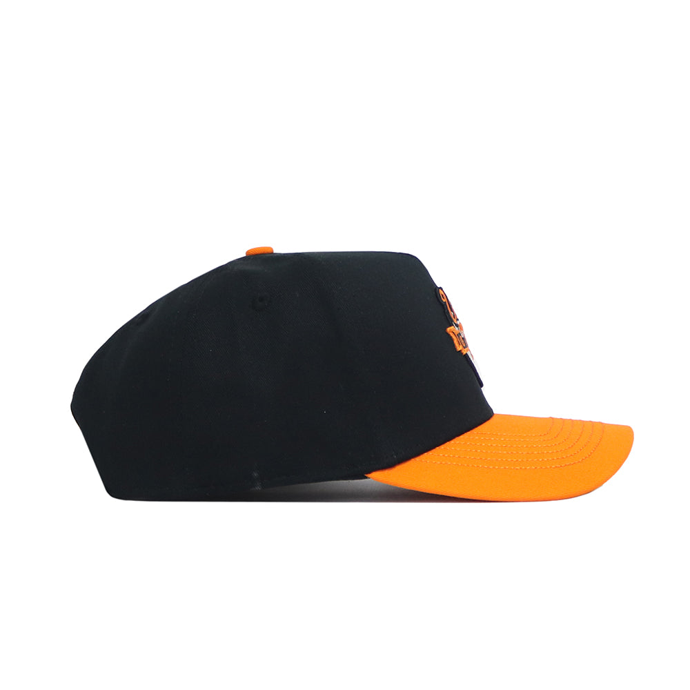 The No Rivals Tennessee Baseball Home Plate Hat is a black cotton blend snapback with an orange brim and top button, embroidered logo, shown side profile against a white background.