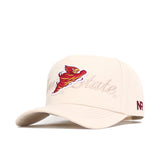 The Iowa State Stacked Hat by No Rivals is a cream cotton baseball cap with an embroidered cardinal mascot and "Iowa State" on the front, red NR stitched on the brim, and a snapback closure for perfect fit.