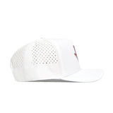 Side view of the Texas Golf Hat - Orange by No Rivals, featuring perforated back panels, a slightly curved brim, and a partial embroidered logo on the front. Made from a soft polyester-cotton blend.