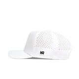The Vanderbilt Golf Hat - White by No Rivals is a snapback with side and back perforations and a black NR logo patch.