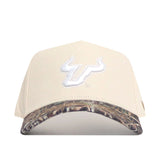 The No Rivals USF Camo Connector Hat features a beige design with a white bull logo, a camo-patterned brim, and a structured high-quality cotton fit.