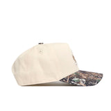The No Rivals Kansas Camo Connector Hat features a beige snapback design with a camo-patterned brim, made from high quality cotton and shown in side view on a white background.
