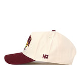 The Minnesota Gopher Stadium Hat by No Rivals is a cream and maroon snapback made from high-quality cotton, featuring embroidered logos—including NR on the side—with a maroon bill, cream crown, and a partially visible colorful design on the front.