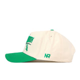 The No Rivals North Texas Mean Green Stride Hat features a cream-colored snapback design with a green brim and green embroidered logos, including “NR” on the side. Shown from a side view against a white background, this cap is perfect for elevating any game day fit.