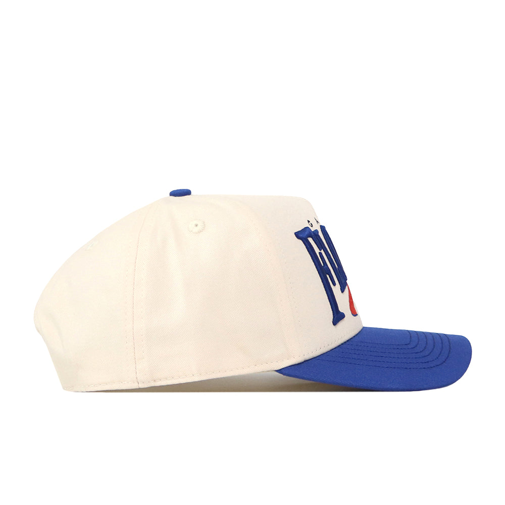 Introducing the Florida Gators Stride Hat by No Rivals—a stylish white baseball cap with a bold blue brim, shown in a side profile. The front displays large, embroidered blue lettering accented by a subtle red detail. Made from premium quality cotton, this cap delivers exceptional comfort and long-lasting durability.