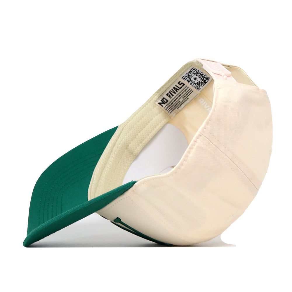 The North Dakota State Bison Stride Hat by No Rivals is shown from the side, flipped inside out to reveal its interior tags, embroidered logos, and a QR code on the sweatband—making it the perfect addition to your gameday fit.