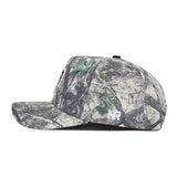 Side view of the NC State Outland Hat by No Rivals, a camouflage snapback with a flat brim and small white NR logo on the back. Made from premium cotton for lasting comfort and style.