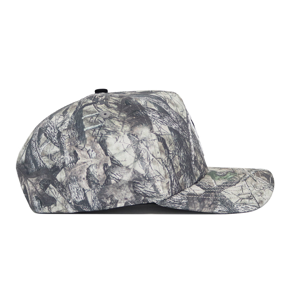 The No Rivals NC State Outland Hat is a structured-fit snapback with a camouflage pattern, shown in side view on a white background, crafted from premium cotton.