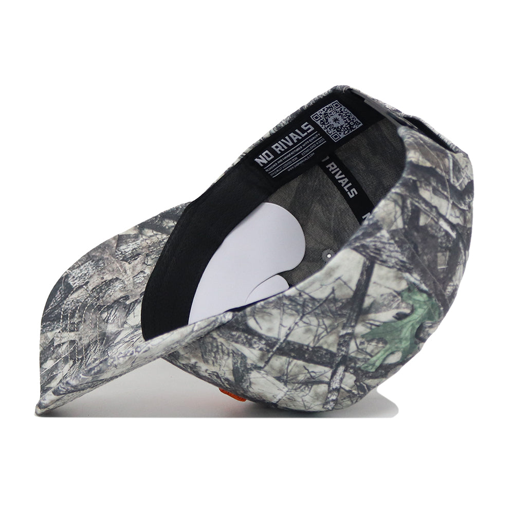 The Tennessee Outland Hat by No Rivals features a woodland camo snapback, structured fit, black band with NO RIVALS text, QR code, and high-quality cotton lining for added comfort and style.
